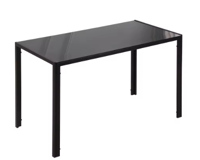 Minimalistische zwarte eettafel met een glazen tafelblad en metalen frame
